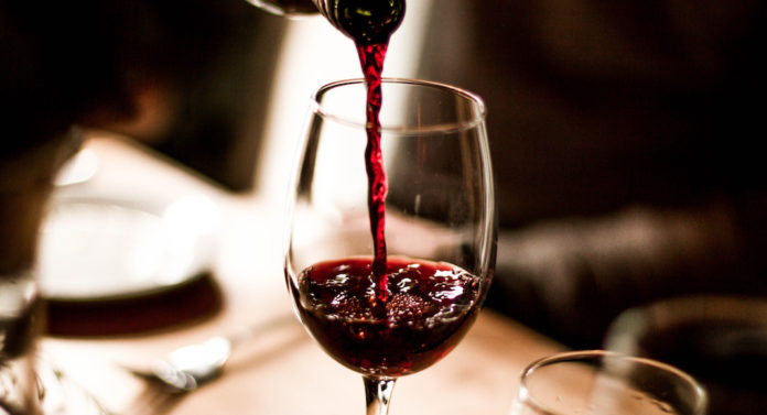 Wine Pouring into Glass